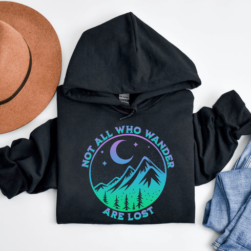 Introducing the perfect addition to your camping wardrobe - our one-of-a-kind hoodie featuring a colorful mountain graphic and the inspiring statement "Not All Who Wander Are Lost".